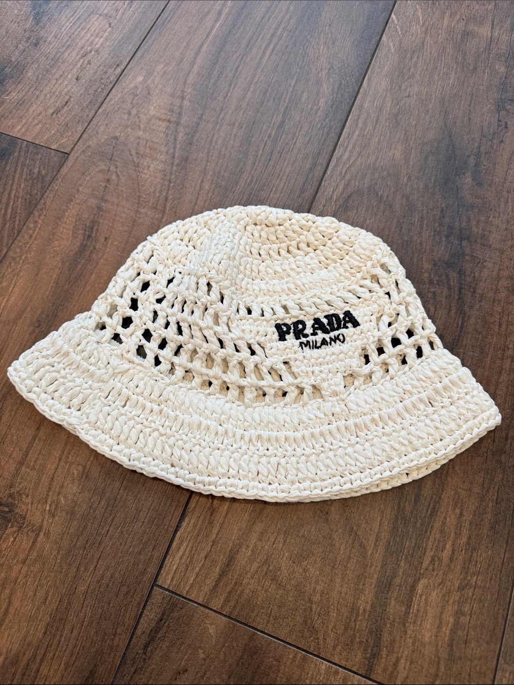 Prada raffia bucket hat women’s Crochet Hat in ivory with Black Logo small
